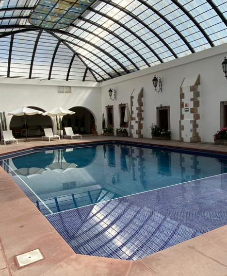 Síguenos Hotel Lagunilla Queretaro